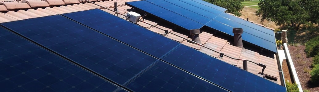 Black SunPower Solar Panels on Clay Tile Roof
